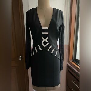 Black Bandage Dress with mesh sleeves and rhinestones aplique.